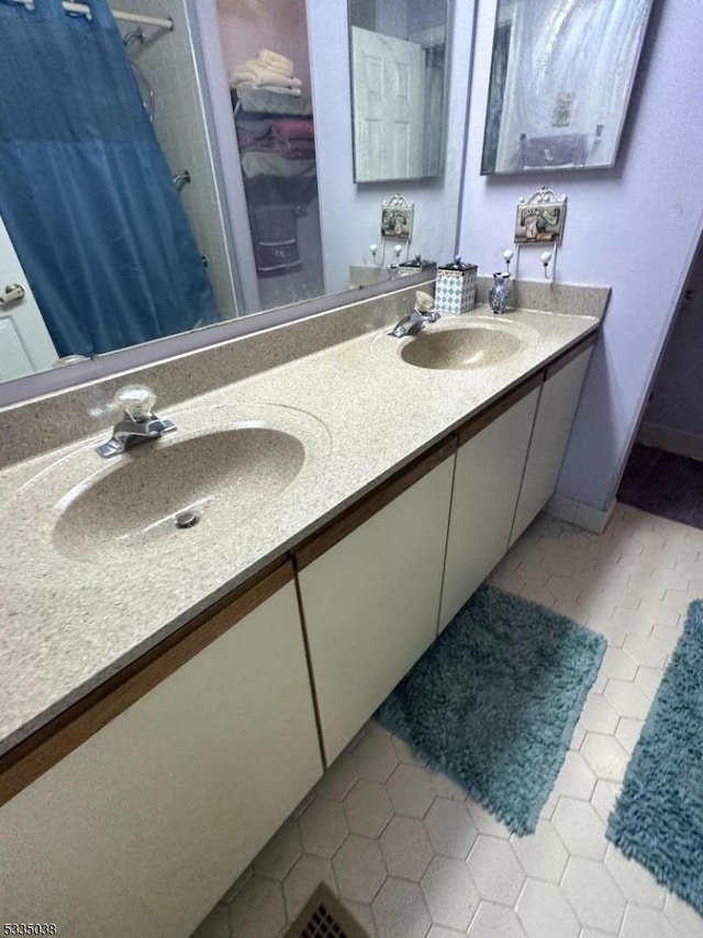 bathroom featuring vanity and walk in shower