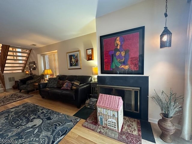 living room featuring wood-type flooring