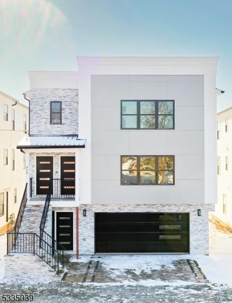 contemporary house featuring a garage