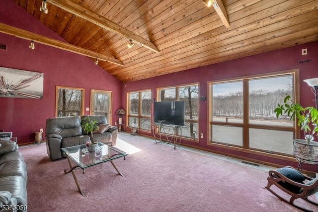 carpeted living room featuring wood ceiling, visible vents, beamed ceiling, and track lighting