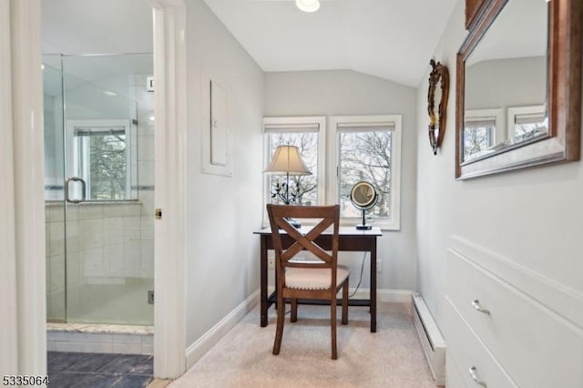 home office featuring lofted ceiling, baseboards, and baseboard heating