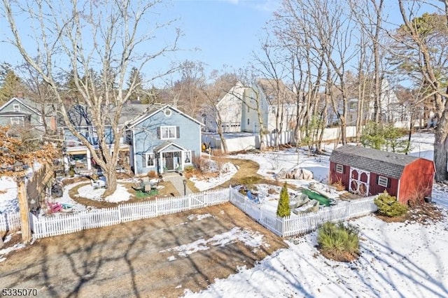 view of front of house with a shed