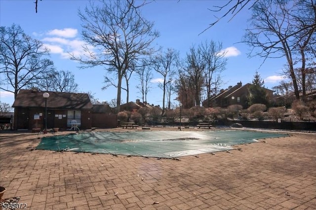 pool featuring a patio area