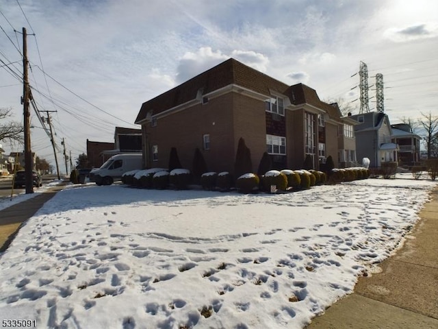 view of snow covered property