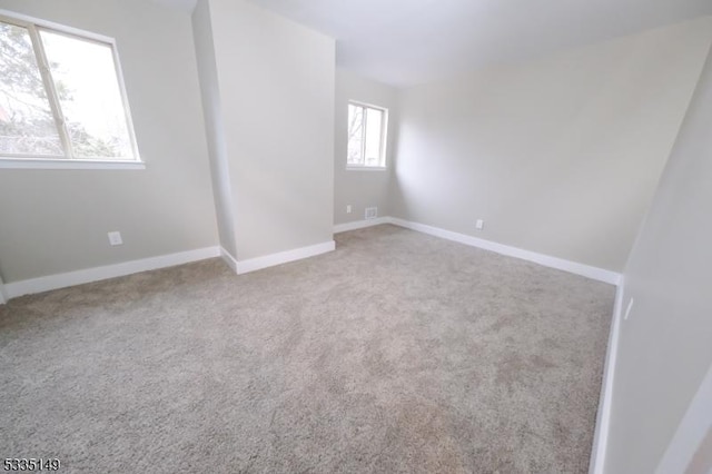 empty room with carpet floors