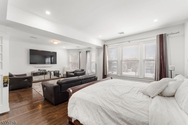 bedroom featuring dark hardwood / wood-style floors