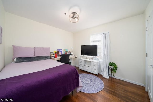 bedroom featuring dark hardwood / wood-style floors