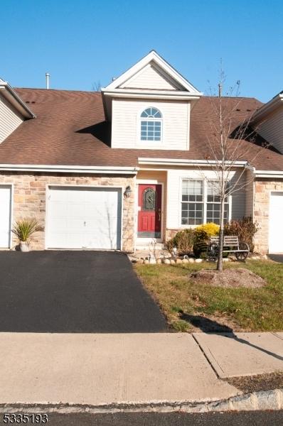 front of property with a garage