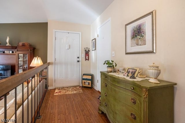 foyer entrance featuring hardwood / wood-style floors