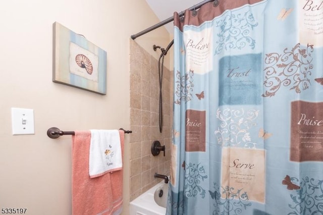 bathroom with shower / tub combo