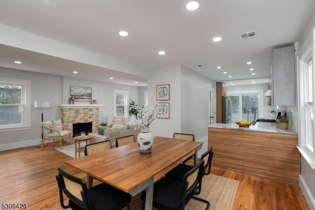 dining area with light wood-type flooring