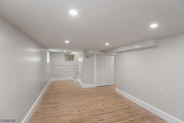 corridor featuring light wood-type flooring