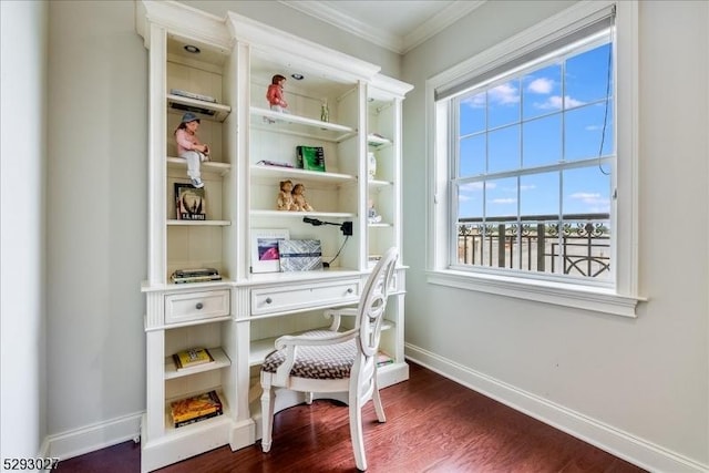 office space with dark wood-type flooring and crown molding