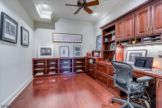 office space with crown molding, ceiling fan, and wood-type flooring