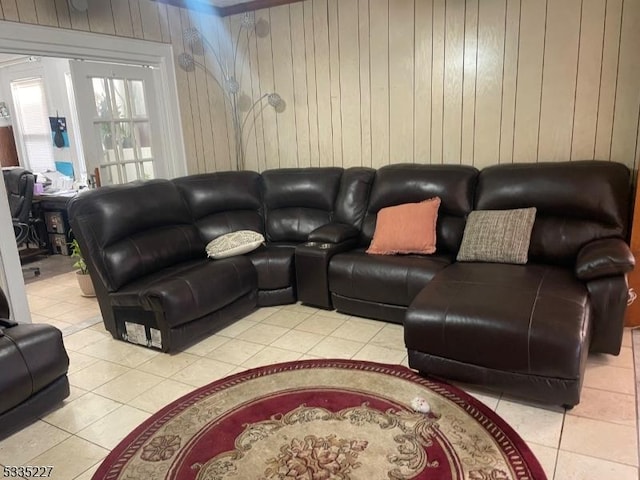 tiled living room with wooden walls