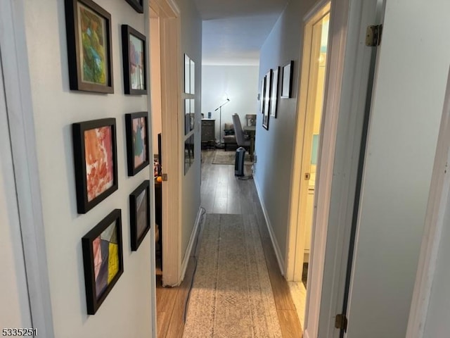 hallway featuring light hardwood / wood-style floors