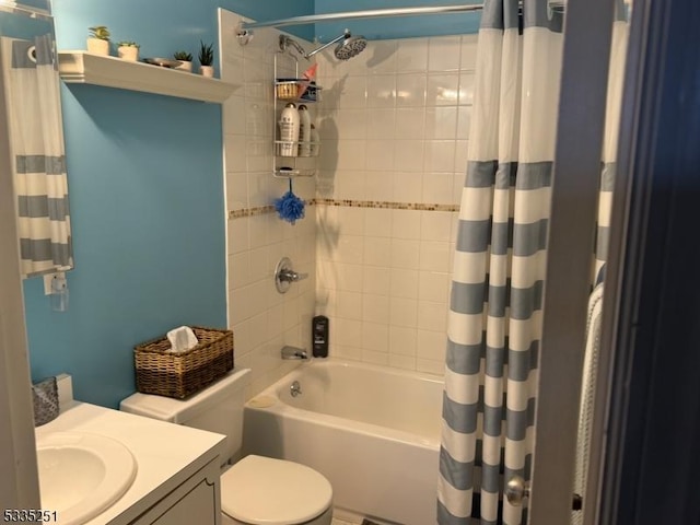 full bathroom with vanity, toilet, and shower / bath combo