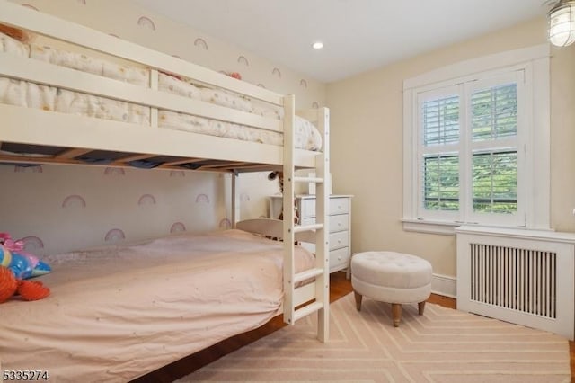 bedroom with radiator heating unit