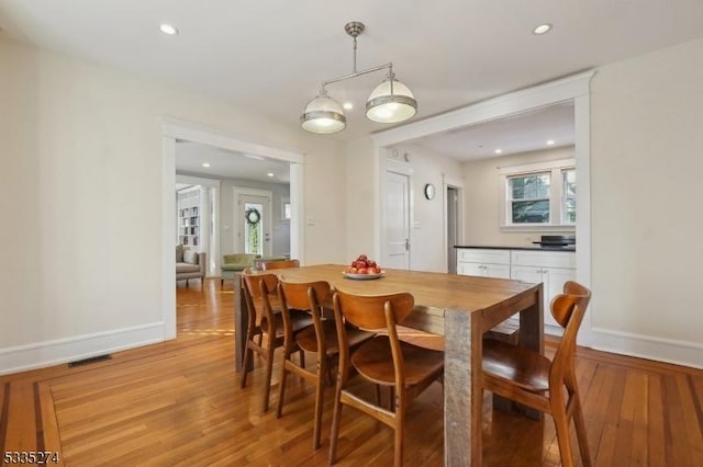 dining room with light hardwood / wood-style floors