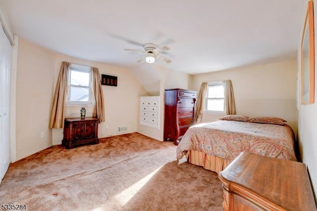 carpeted bedroom with ceiling fan