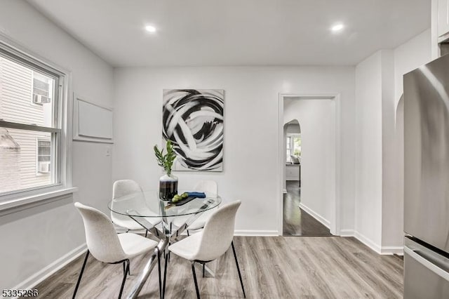 dining space featuring light hardwood / wood-style flooring