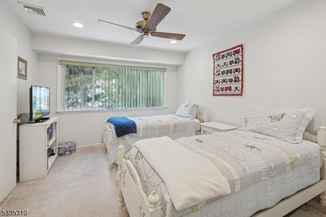 bedroom with light carpet, ceiling fan, visible vents, and recessed lighting