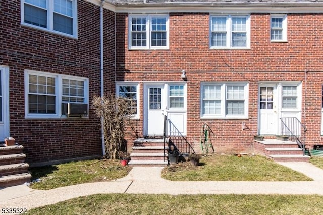 view of front of home featuring cooling unit