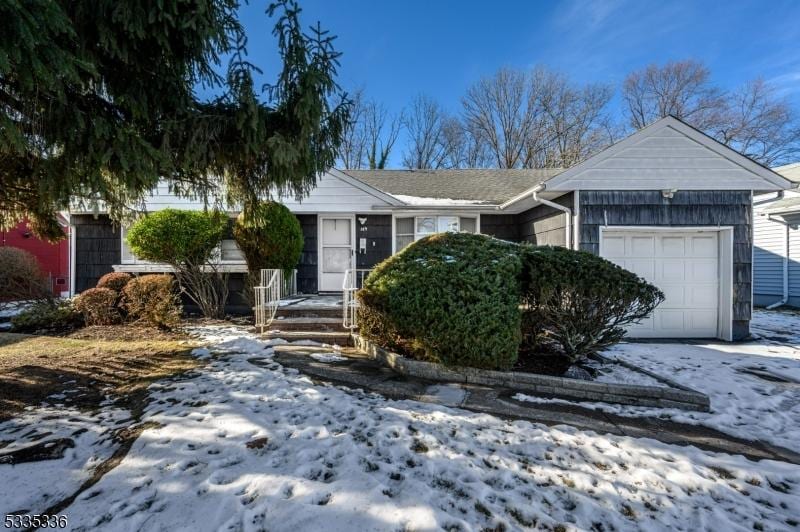 single story home with a garage