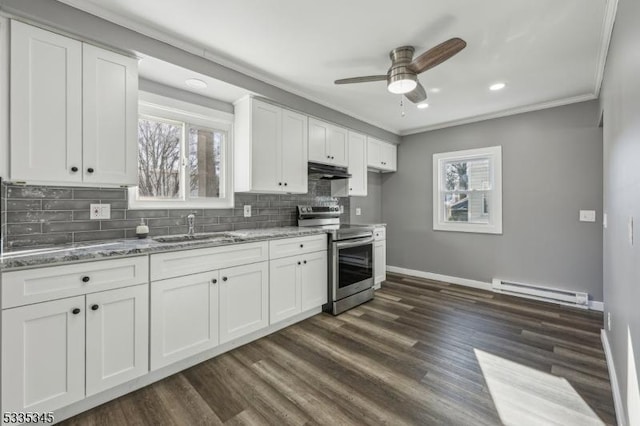 kitchen featuring light stone counters, sink, stainless steel electric stove, and white cabinets