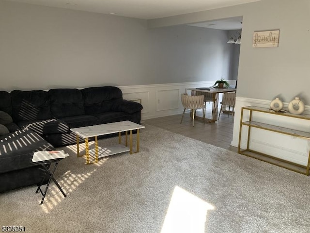 living room with tile patterned flooring