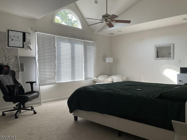 bedroom featuring lofted ceiling, ceiling fan, and carpet flooring