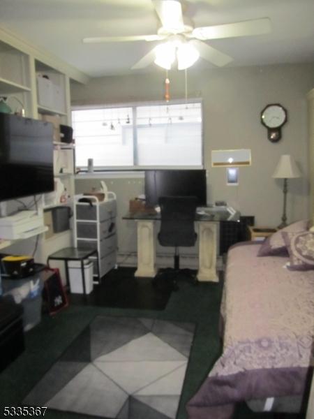 interior space featuring dark tile patterned flooring