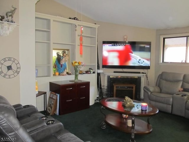 living room featuring lofted ceiling and carpet