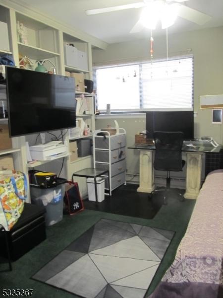 living room with ceiling fan