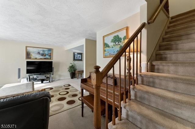 living room with a textured ceiling