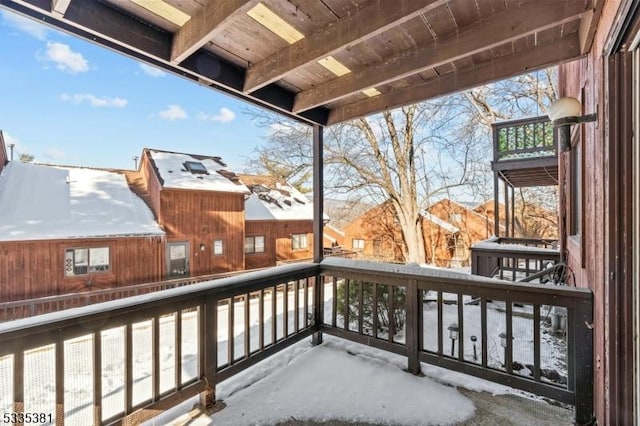 view of snow covered deck