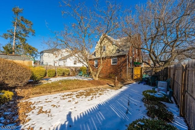 view of snow covered property