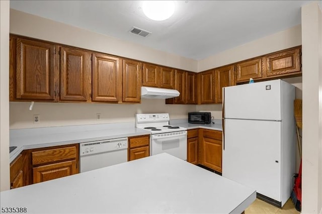 kitchen featuring white appliances