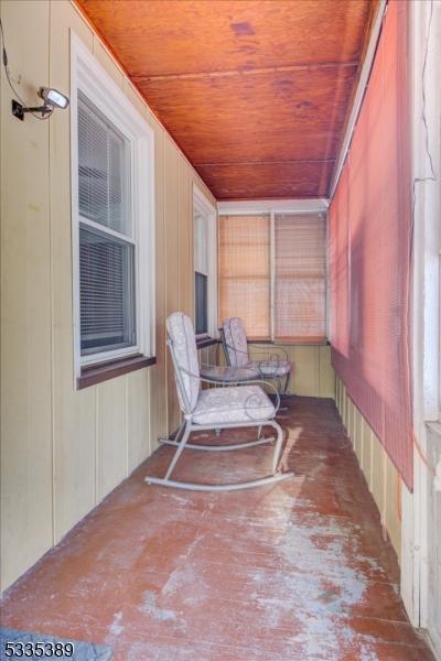 sunroom with wood ceiling