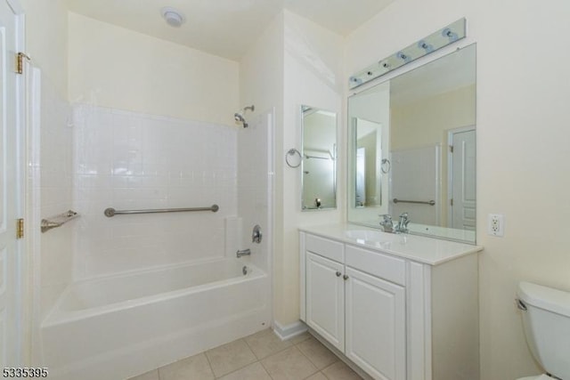 full bathroom featuring vanity, shower / tub combination, tile patterned floors, and toilet