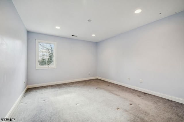 spare room with carpet flooring