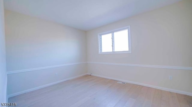 empty room featuring light wood-type flooring