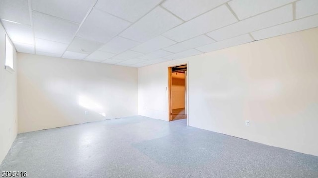 spare room featuring a drop ceiling