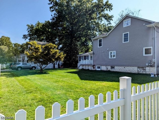 view of home's exterior featuring a yard