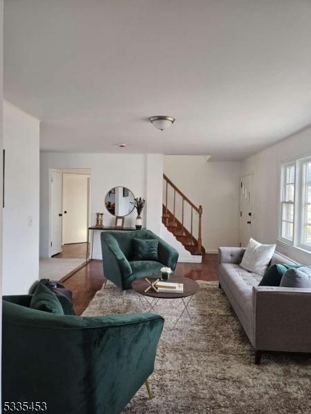 living room with wood-type flooring