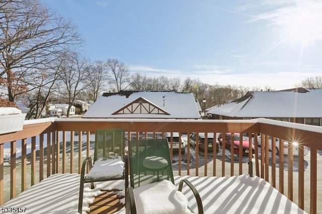 view of snow covered deck