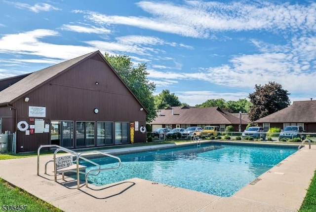 view of pool featuring a patio