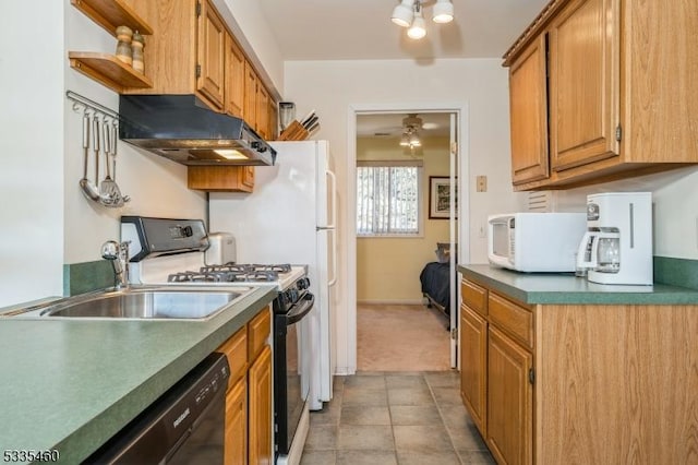 kitchen featuring sink, black dishwasher, gas stove, light tile patterned flooring, and exhaust hood