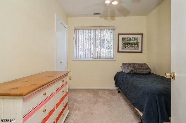 carpeted bedroom featuring ceiling fan