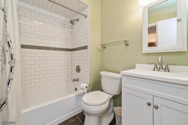 full bathroom featuring shower / tub combo with curtain, vanity, and toilet